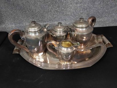 null Tea and coffee set in silver plated metal and wooden handles,
Including 4 pieces...