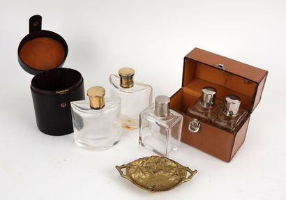 null Puiforcat, 2 bottles in their case. 
A box with 3 bottles and a small gilded...