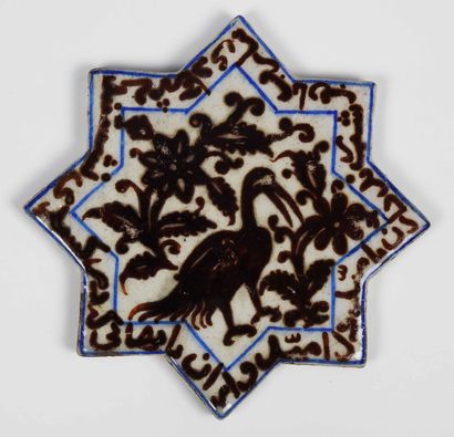 null Octagonal Islamic tile in polychrome ceramic
Kashan style representing a bird...