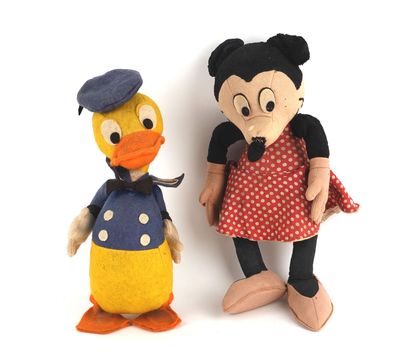 null DISNEY
2 figurines en tissu rembourré de paille Minnie et Donald
Donald porte...
