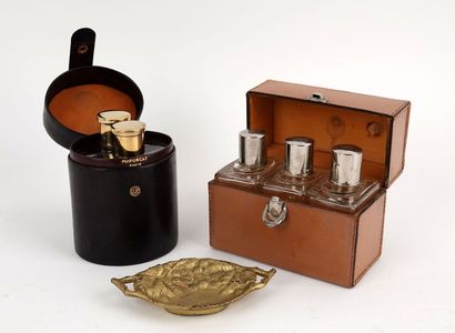 null Puiforcat, 2 bottles in their case. 
A box with 3 bottles and a small gilded...
