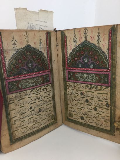 null Antique manuscript: In-12 contemporary red basane with flap, boards decorated...