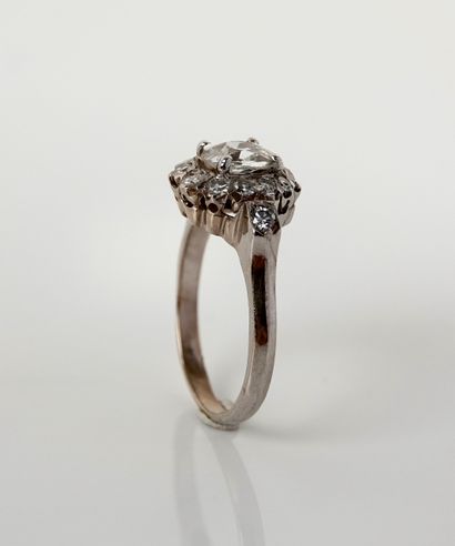 null White gold ring, 750 MM, centered with an oval old-cut diamond weighing 0.90...