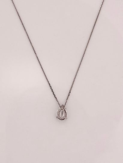 null Chain and pendant in white gold, 750 MM, setting a pear-cut diamond weighing...