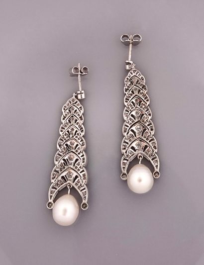 null Earrings formed of an articulated drape in white gold, 750 MM, covered with...