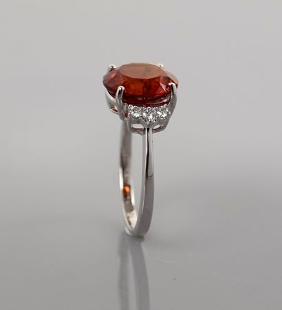 null Ring in white gold, 750 MM, set with a round spessartite weighing 5 carats between...