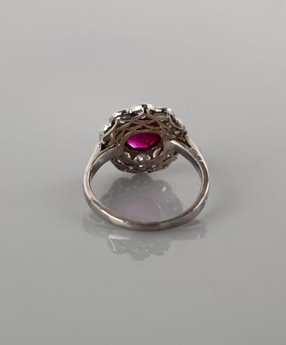 null Ring in white gold 750MM and, platinum 900 MM, centered of a round ruby (wear...