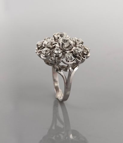 null Ring in , platinum 900 MM, centered with four round diamonds in a row of diamonds...