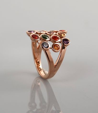 null Ring in pink gold, 750 MM, covered with diamonds, garnets, multicolored sapphires,...