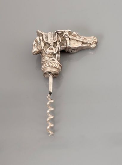 null Corkscrew in the form of horse head, saddle and dog in silver plated bronze,...