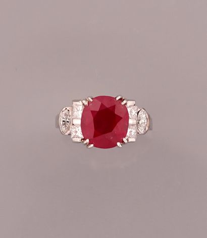 null White gold ring, 750 MM, set with a cushion-cut ruby weighing 3.59 carats accompanied...