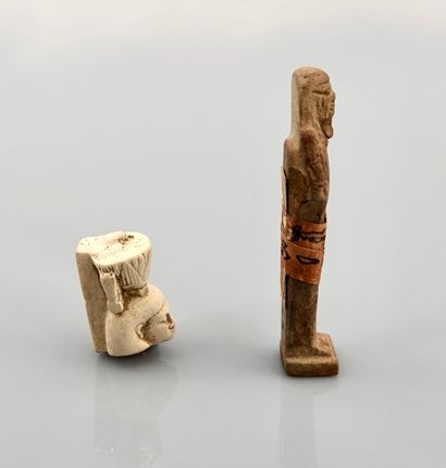 null Lot including a fragment of a statuette representing Nefertoum wearing a lotus...