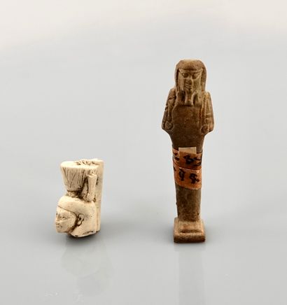 null Lot including a fragment of a statuette representing Nefertoum wearing a lotus...