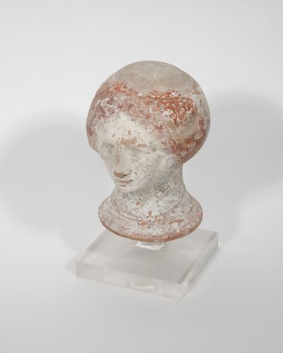 null Dummy female head in terracotta with engobe
H. 17 cm
Restorations
Style of the...