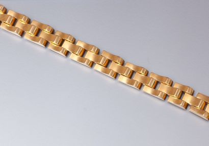 null Bracelet tank en or jaune 18k à maillons géométriques articulés.

L : 18 cm....