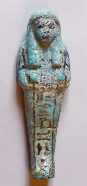 EGYPTE Chaouabti d'un pontife Fritte turquoise à rehauts noirs.Nouvel Empire. Egypte.H:14cm.Cassé...