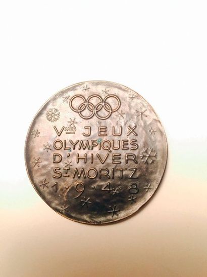null Médaille de participant aux JO d'Hiver. Bronze. Diam: 4 cm. Poids: 25g.