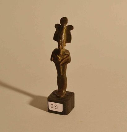 null Dieu Osiris.
Bronze.
Style de la Basse Epoque.
H: 9,5cm.