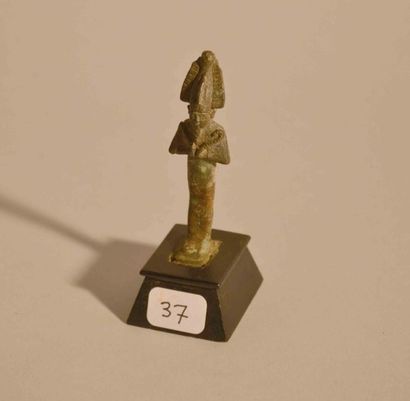 Fin Dieu Osiris, amulette portant une bélière.
Bronze.
Basse...