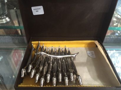 null 12 portes couteaux figurants des chiens en métal argenté de style art

déco