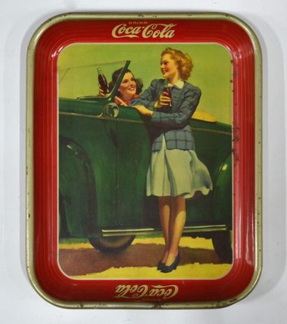 null Coca Cola ®
Plateau de service, USA 1942
Piquures et rouille
34 x 27 cm