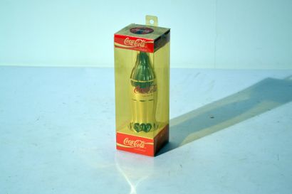 null Coca Cola ®
Bouteille dorée en boite 1994