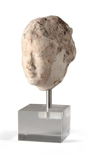 EGYPTE Tête masculine
Calcaire
Basse-Époque, XXVI° dynastie
Règne d'Amasis
Hauteur...