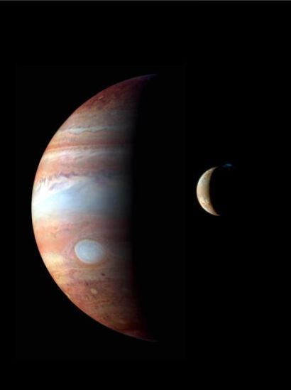 null NASA Montage photographique faisant apparaître les planètes Jupiter et sa lune...