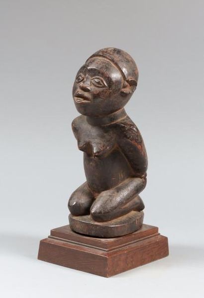 CONGO 
Representation d'un esclave menotté les mains dans le dos
Bois sculpté
Haut.:...
