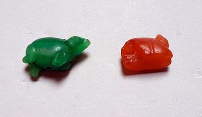null Deux amulettes en forme d'animaux

1,8 à 2,3 cm