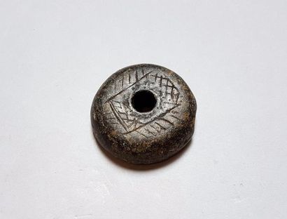 null Cachet orné de symboles magiques

Hématite 4,5 cm

Période antique