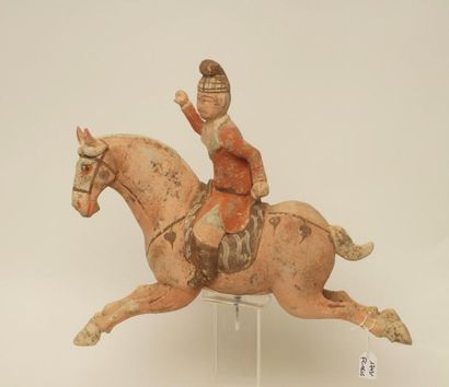 Chine, dynastie Tang (618-907 ap. J.-C.) 
Joueur de polo Tang
Chevauchant sa monture...
