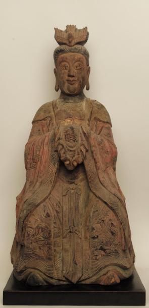 Chine, XIX° siècle Guan Yin
Représentée assise, un oiseau en couronne
Bois polychrome
Haut.:...