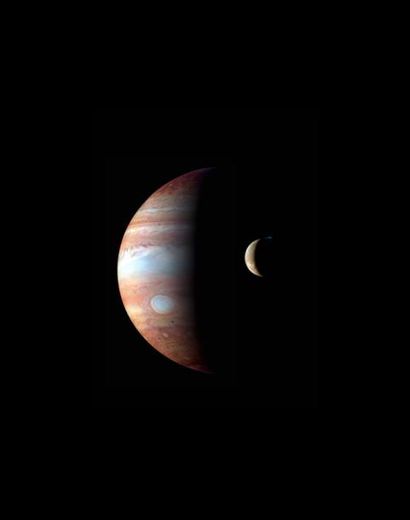 null NASA. Vue de la planète Jupiter et de sa Lune volcanique "IO" réalisée par la...
