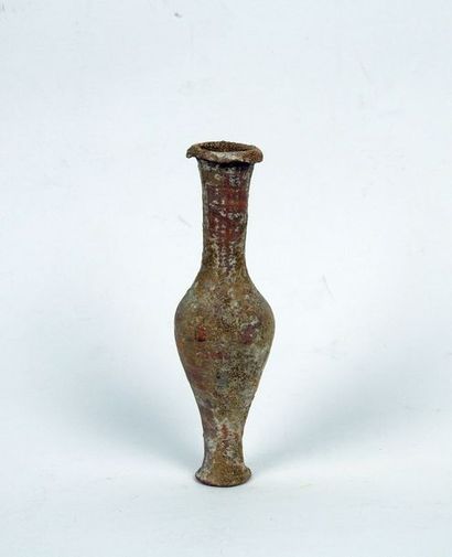 null Vase à long col

Terre cuite 12 cm

Période romaine
