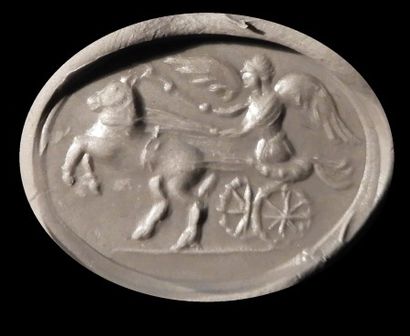 null Intaille représentant une Victoire dans un bige.Agate rubanée.Art romain.
I-IIès.L:...
