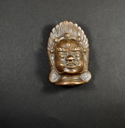 null Applique.Tête du Démon protecteur Mahakhala.
Bronze.Circa XVIII ès.
Tibet.H:...