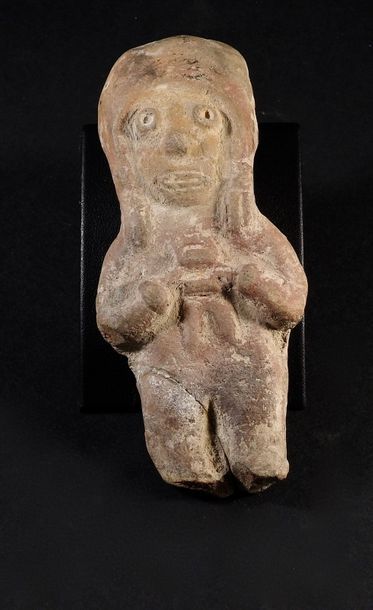 null Statuette de maternité tenant son bébé dans les bras

Terre cuite 10 cm

Précolombie...