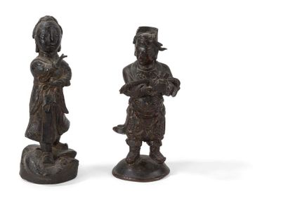 null Deux statuettes en bronze
Chine, dynastie Ming, XVIIème siècle
La première représentant...