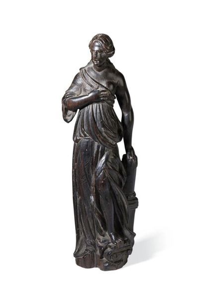 null FIGURE FEMININE EN EBENE SCULPTE *
XVIIème siècle 
Haut.: 21 cm
