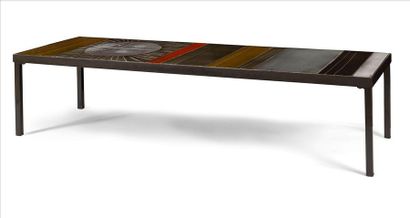 null Roger CAPRON (1922-2006)
" Soleil "
Large rectangular coffee table.
The structure...