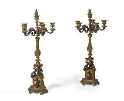 null Pair of CANDELABRES IN THE TASTE OF RENAISSANCE
in patinated and gilded bronze,...