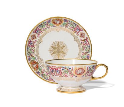 null SEVRES
Tasse à thé et une soucoupe en porcelaine du service des chasses de Louis-Philippe...