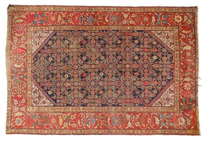 null IRAN FERAGHAN 
CARPET Large knotted wool carpet, blue background. 
292 x 197...