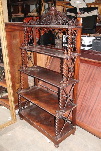 null Moulded and carved mahogany 5-step shelf. The uprights in spiral and crossbars,...