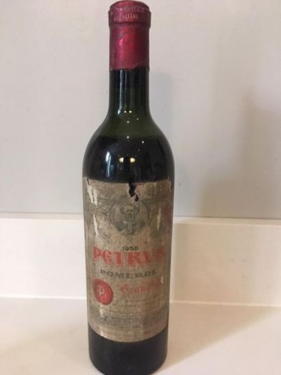 null 1958 - Pétrus rouge Pomerol - 1 dirty and torn label in the top half of the...