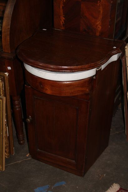 null Mahogany and earthenware bathroom furniture, a flap revealing a washbasin and...
