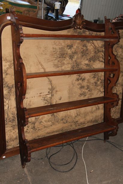 null 4-step wall shelf in stained wood, the uprights have an openwork design.

19th...