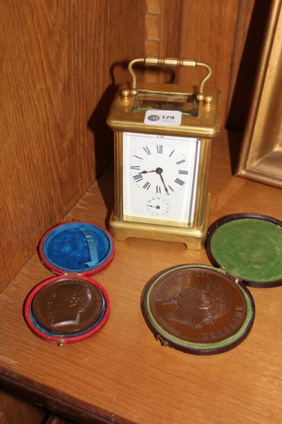 null Brass travel clock

Late 19th century.

A bronze medal Société immobilière du...