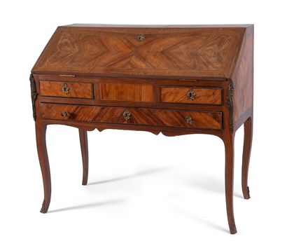 null Sloping desk in rosewood marquetry, slightly curved legs, with three drawers...